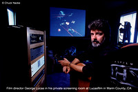 Film director George Lucas in his private screening room at Luca