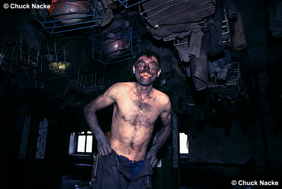 Russian Coal Miner after shift in the changing room of a mine, Shakhty, RU